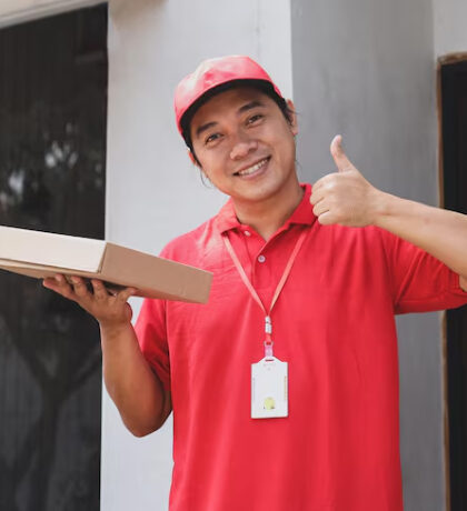Gig worker unloading parcels from a van